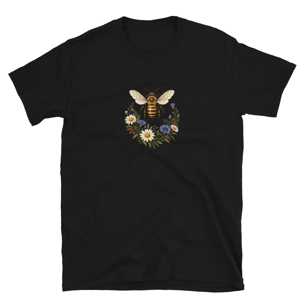 Black short-sleeve shirt with a small golden honeybee and wildflowers printed at the chest